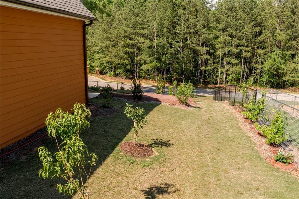 4 bedroom, 2 bathroom, 2,283 sq ft single family residence for sale at 115 Sourwood Drive, Mansfield, GA 30055 — photo 3