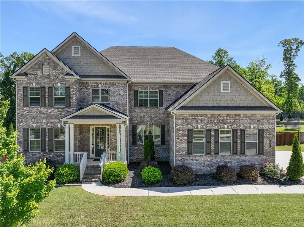 6 bedroom, 6 bathroom, 6,456 sq ft single family residence for sale at 5911 Ashley Falls Lane, Flowery Branch, GA 30542 — photo 1 of 79