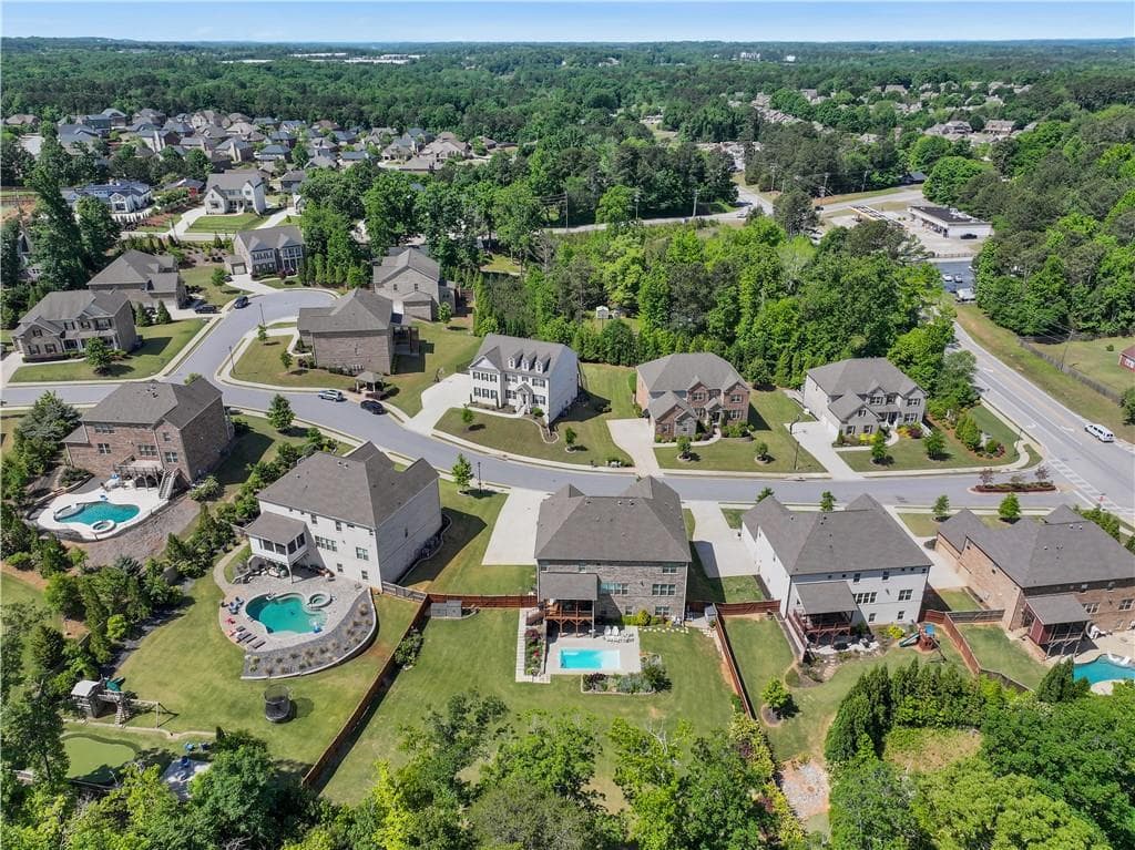 6 bedroom, 6 bathroom, 6,456 sq ft single family residence for sale at 5911 Ashley Falls Lane, Flowery Branch, GA 30542 — photo 4