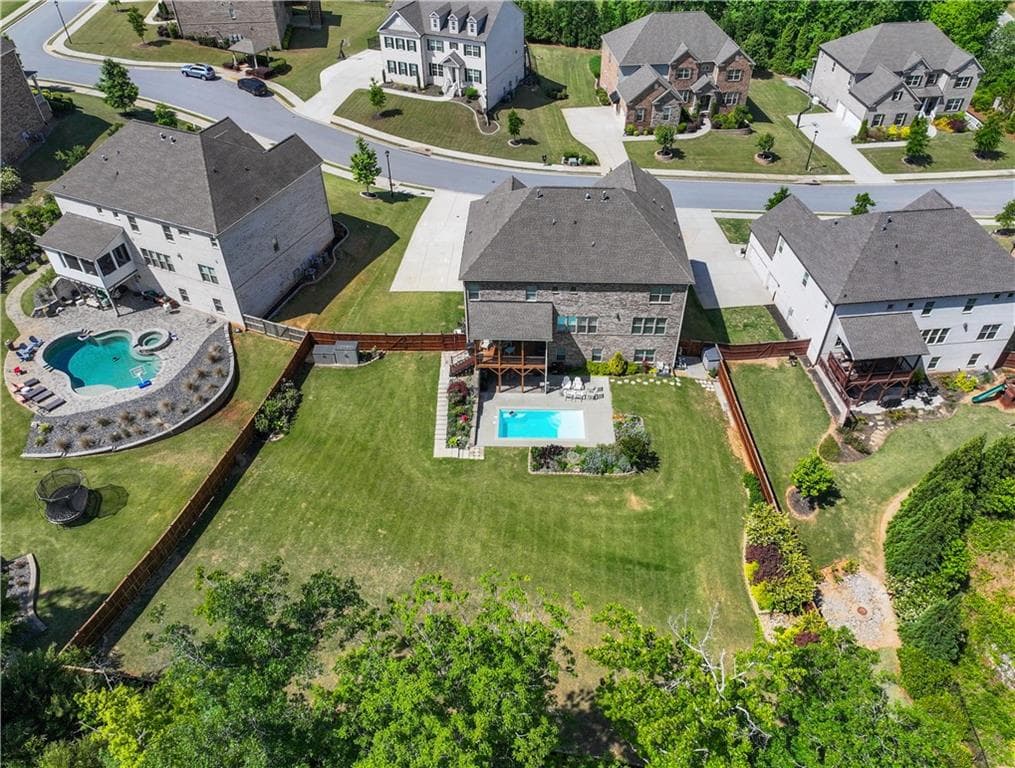 6 bedroom, 6 bathroom, 6,456 sq ft single family residence for sale at 5911 Ashley Falls Lane, Flowery Branch, GA 30542 — photo 5