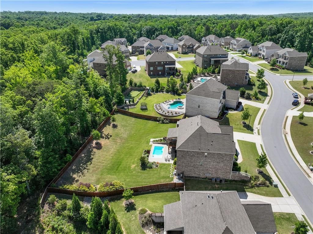 6 bedroom, 6 bathroom, 6,456 sq ft single family residence for sale at 5911 Ashley Falls Lane, Flowery Branch, GA 30542 — photo 6