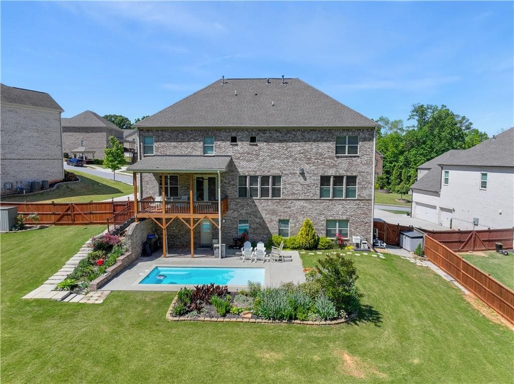 6 bedroom, 6 bathroom, 6,456 sq ft single family residence for sale at 5911 Ashley Falls Lane, Flowery Branch, GA 30542 — photo 7