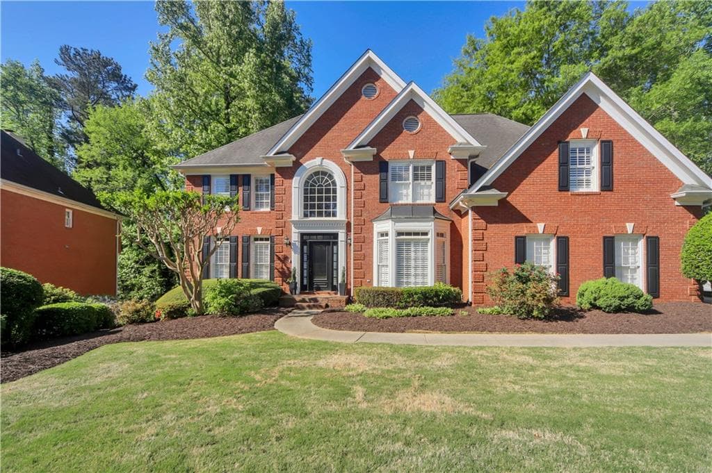 6 bedroom, 4 bathroom, 5,708 sq ft home for sale at 10605 Oxford Mill Circle, Johns Creek, GA