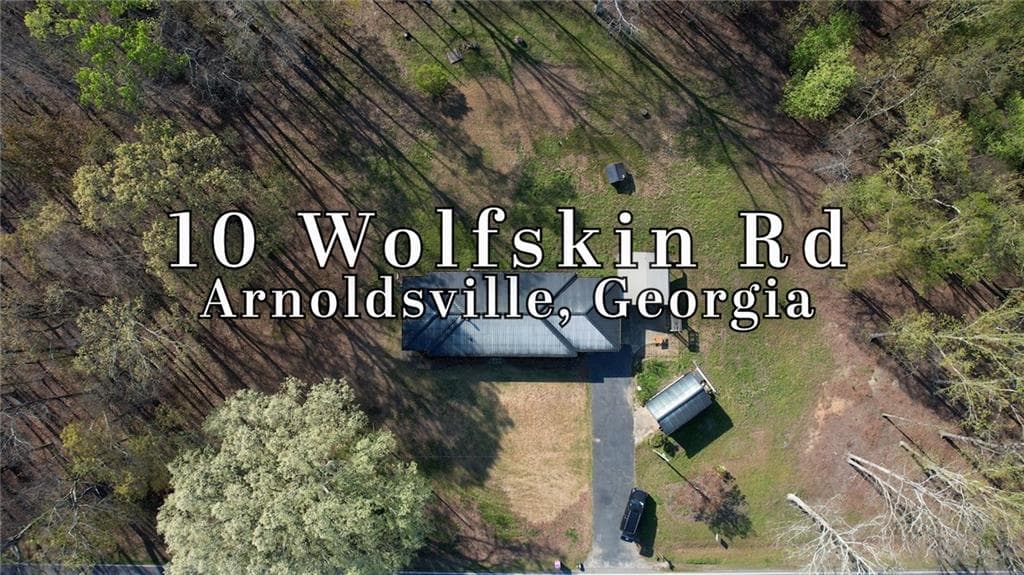 3 bedroom, 2 bathroom, 2,249 sq ft single family residence for sale at 10 Wolfskin Road, Arnoldsville, GA 30619 — photo 2