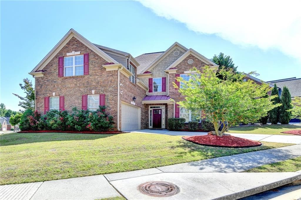 4 bedroom, 4 bathroom, 2,498 sq ft single family residence for sale at 409 Arbor Lane, Loganville, GA 30052 — photo 2