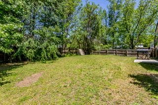 4 bedroom, 2 bathroom, 2,551 sq ft single family residence for sale at 3311 SW Caleb Road, Snellville, GA 30039 — photo 4