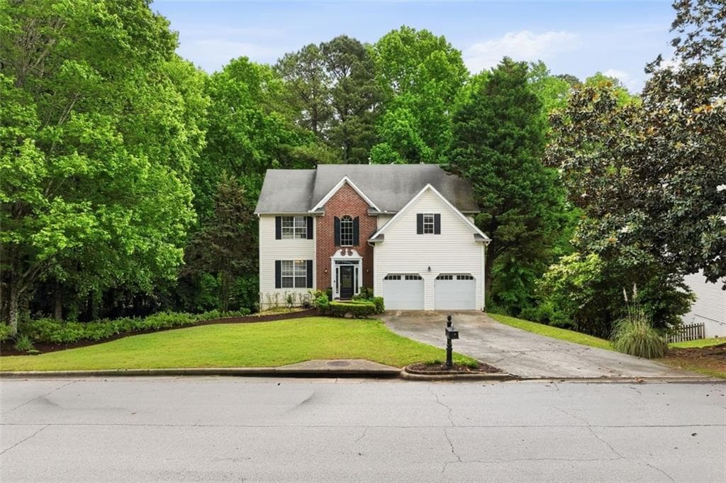 4 bedroom, 3 bathroom, 2,396 sq ft single family residence for sale at 2219 Brickton Crossing, Buford, GA 30518 — photo 3