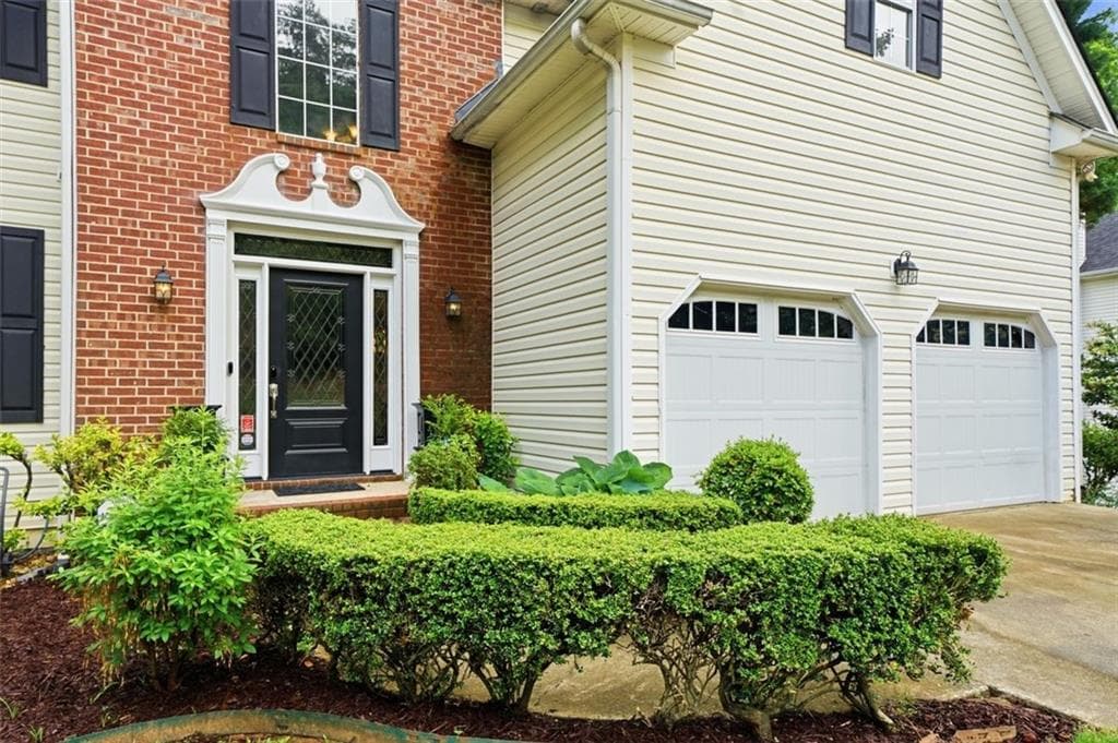 4 bedroom, 3 bathroom, 2,396 sq ft single family residence for sale at 2219 Brickton Crossing, Buford, GA 30518 — photo 2