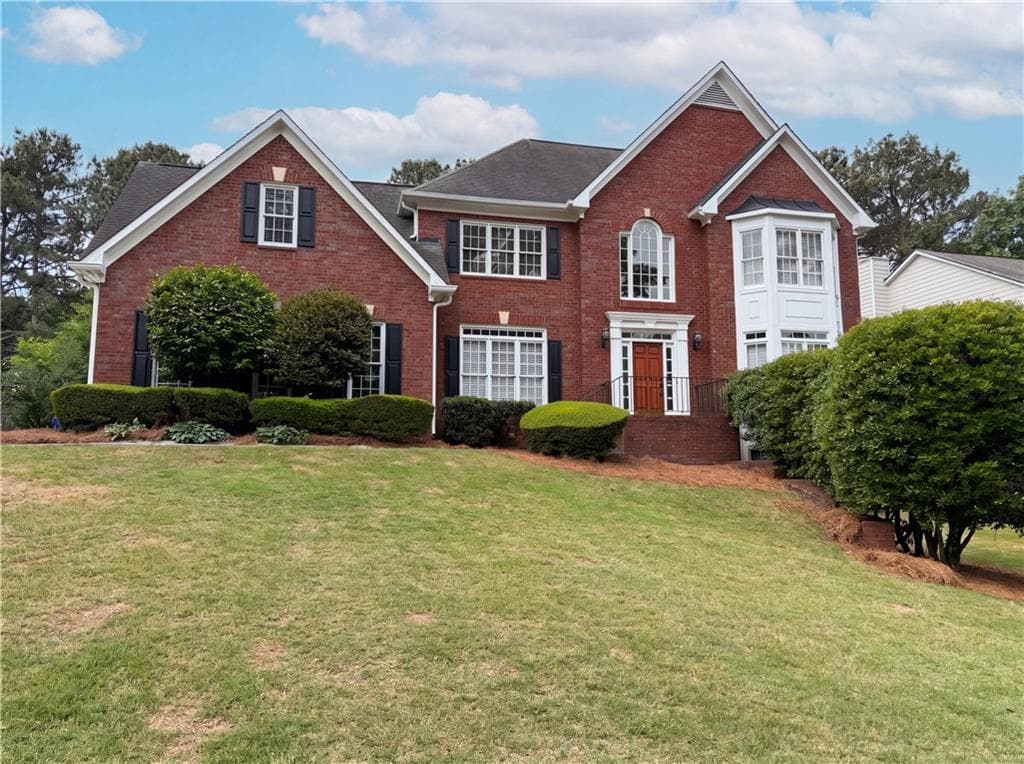 4 bedroom, 4 bathroom, 3,706 sq ft single family residence for sale at 1900 Milfield Circle, Snellville, GA 30078