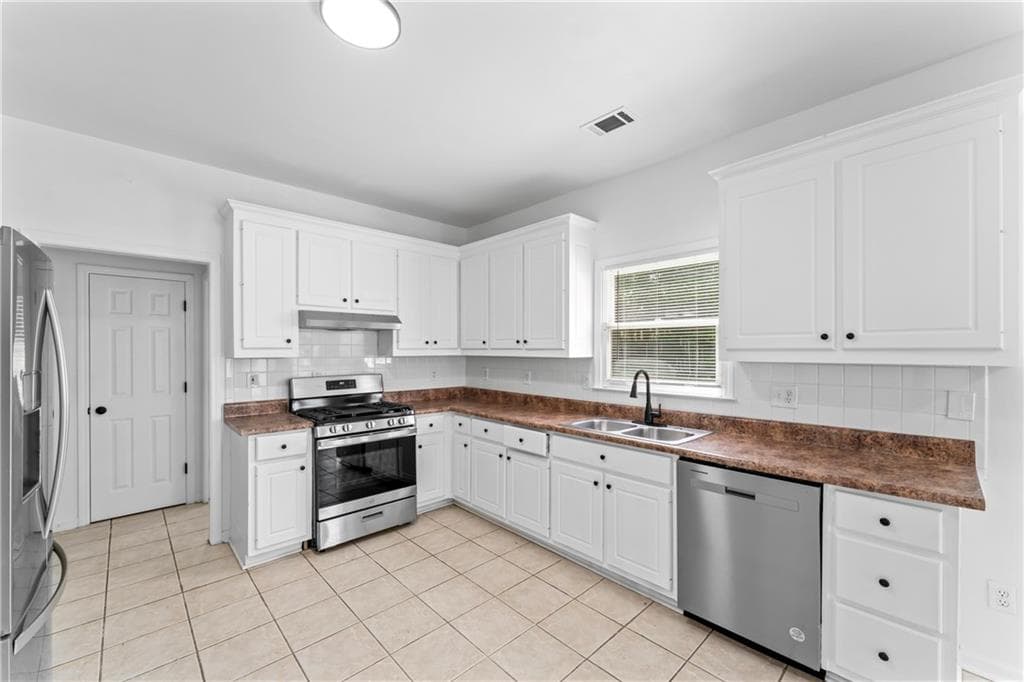 4 bedroom, 3 bathroom single family residence for rent at 4267 Azalea Walk, Ellenwood, GA 30294 for $2,890 a month — photo 6