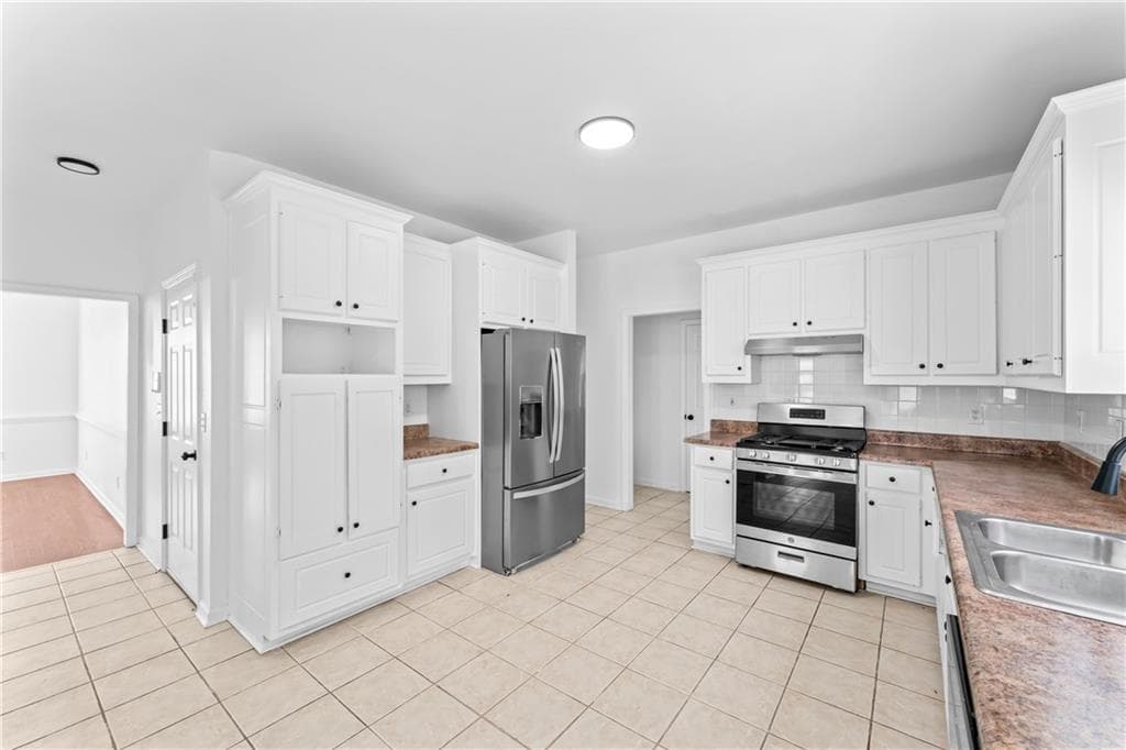 4 bedroom, 3 bathroom single family residence for rent at 4267 Azalea Walk, Ellenwood, GA 30294 for $2,890 a month — photo 7