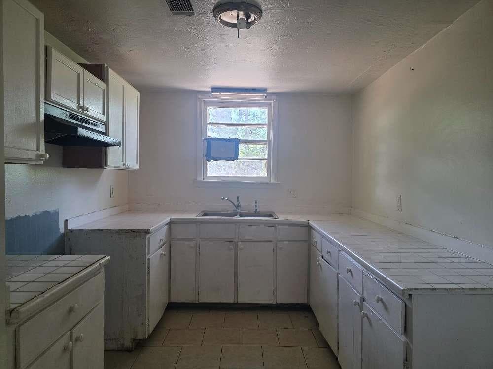 4 bedroom, 1 bathroom, 1,252 sq ft single family residence for sale at 3127 Hendrix Circle, Covington, GA 30014 — photo 10