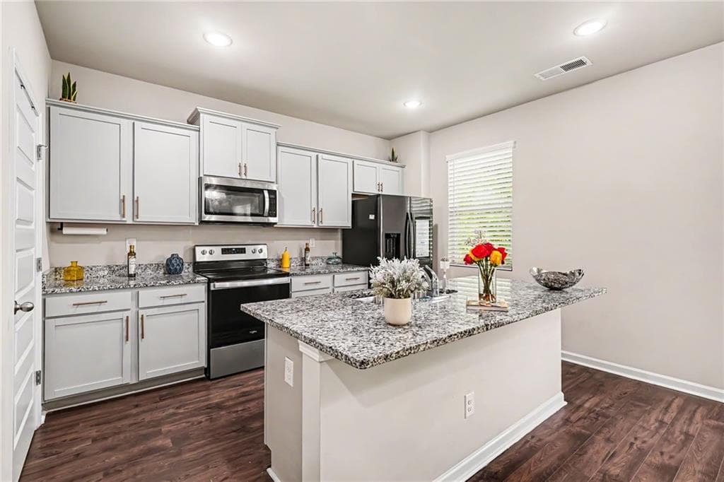 4 bedroom, 3 bathroom, 2,268 sq ft single family residence for sale at 1255 Brookstone Circle, Conyers, GA 30012 — photo 3