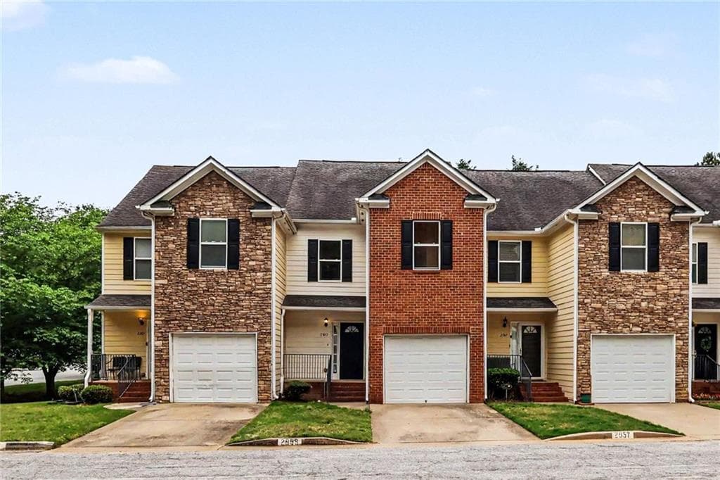 3 bedroom, 4 bathroom, 2,074 sq ft townhouse for sale at 2959 Stonecrest Lane, Lithonia, GA 30038