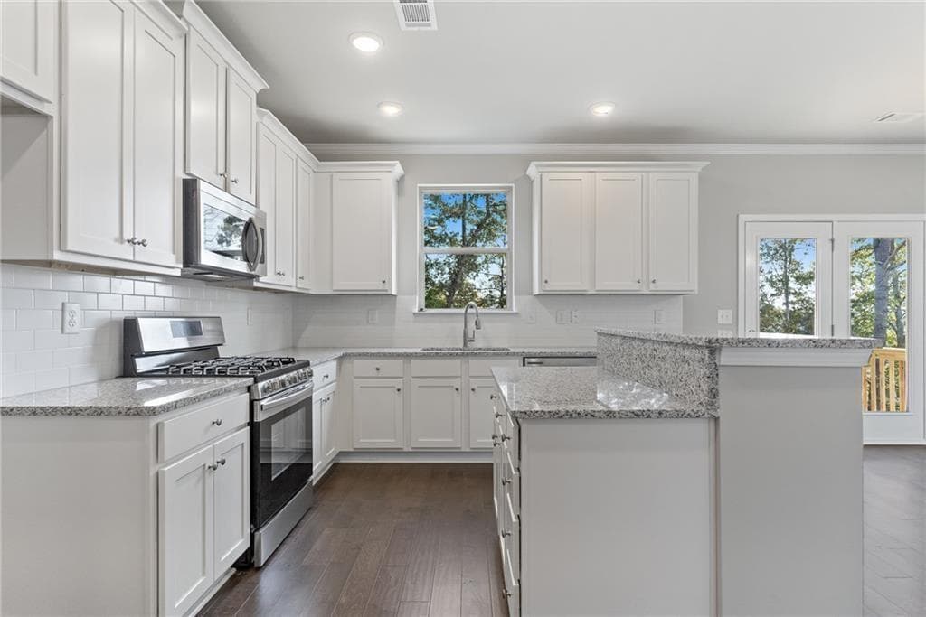 4 bedroom, 3 bathroom, 2,428 sq ft single family residence for sale at 3976 Lockaby Way, Lawrenceville, GA 30044 — photo 10