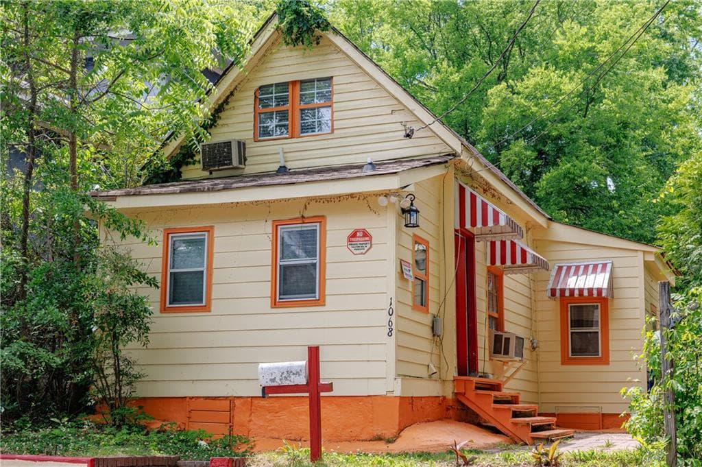 4 bedroom, 2 bathroom, 900 sq ft single family residence for sale at 1068 Snyder Street, Atlanta, GA 30318