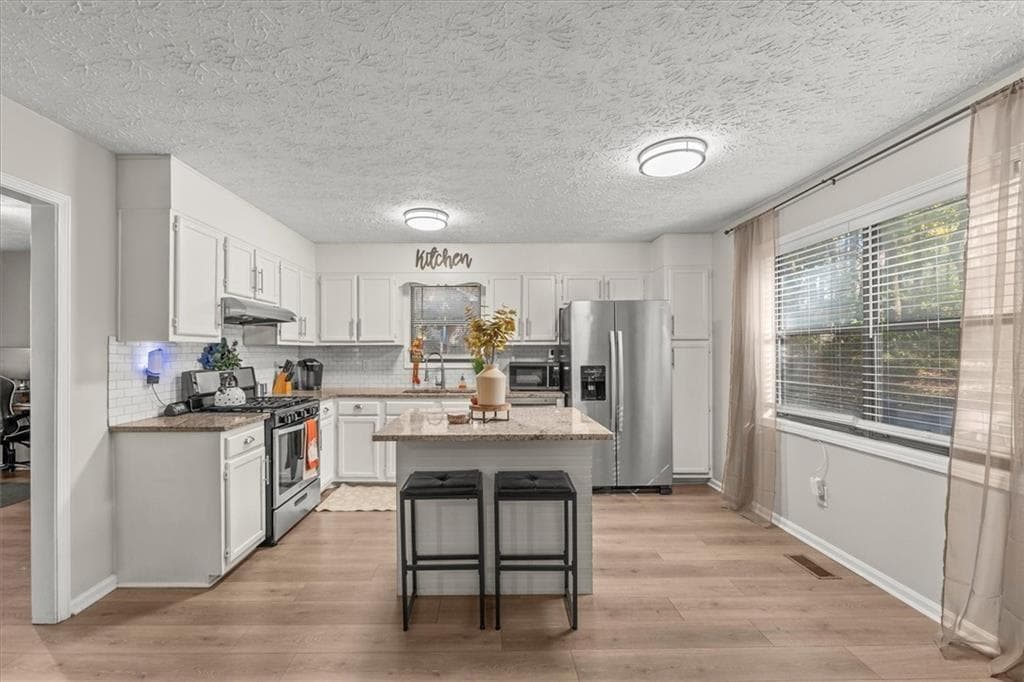 3 bedroom, 2 bathroom, 1,404 sq ft single family residence for sale at 4041 Woodbridge Court, Powder Springs, GA 30127 — photo 6