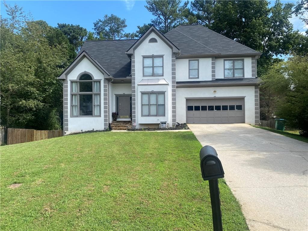 5 bedroom, 4 bathroom, 3,384 sq ft single family residence for sale at 2170 Thorndale Drive, Lilburn, GA 30047