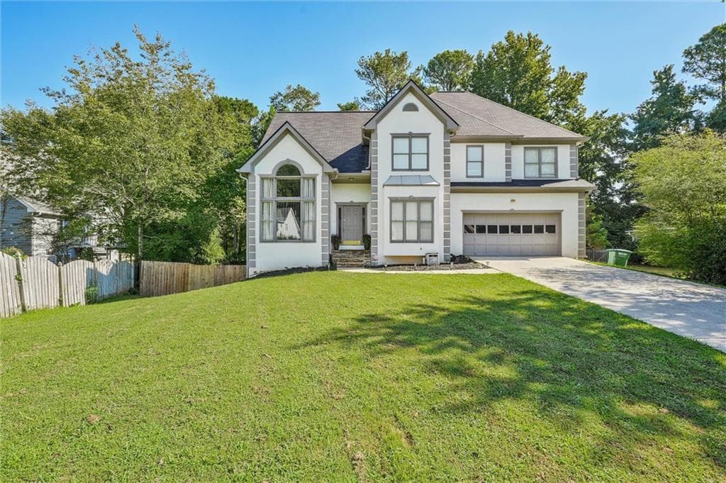 5 bedroom, 4 bathroom, 3,384 sq ft single family residence for sale at 2170 Thorndale Drive, Lilburn, GA 30047 — photo 2
