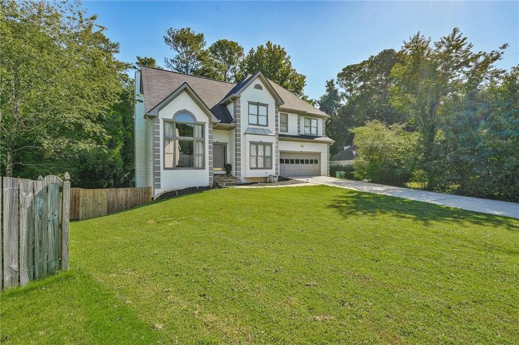5 bedroom, 4 bathroom, 3,384 sq ft single family residence for sale at 2170 Thorndale Drive, Lilburn, GA 30047 — photo 3