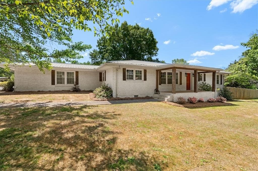 4 bedroom, 2 bathroom, 2,272 sq ft single family residence for sale at 1172 Alabama Street, Carrollton, GA 30117 — photo 2