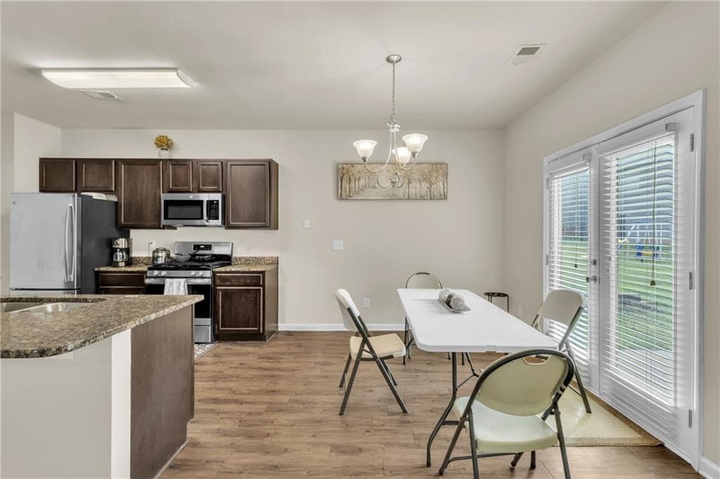 4 bedroom, 3 bathroom, 2,071 sq ft single family residence for rent at 203 August West Way, Lawrenceville, GA 30046 for $2,400 a month — photo 6