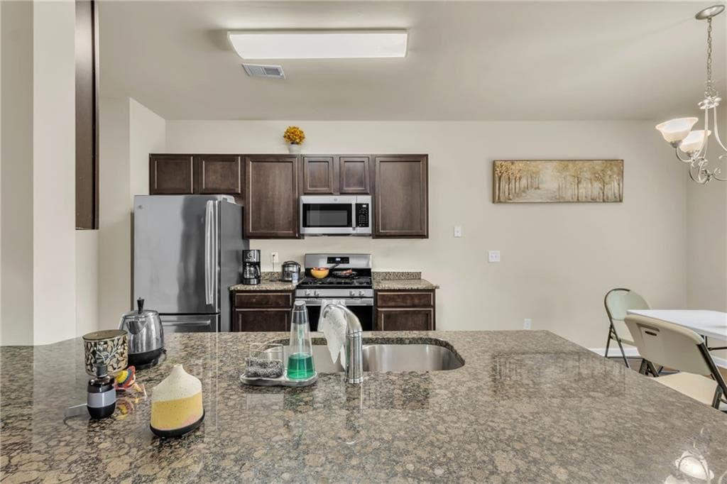 4 bedroom, 3 bathroom, 2,071 sq ft single family residence for rent at 203 August West Way, Lawrenceville, GA 30046 for $2,400 a month — photo 7