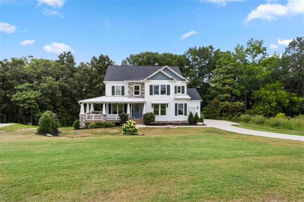 6 bedroom, 4 bathroom, 4,024 sq ft single family residence for sale at 1585 Dabbs Bridge Road, Dallas, GA 30132 — photo 2
