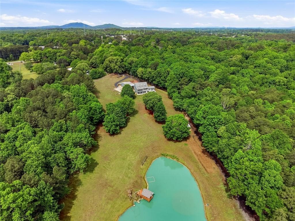 4 bedroom, 4 bathroom, 4,218 sq ft single family residence for sale at 5021 Elrod Circle, Cumming, GA 30041 — photo 2