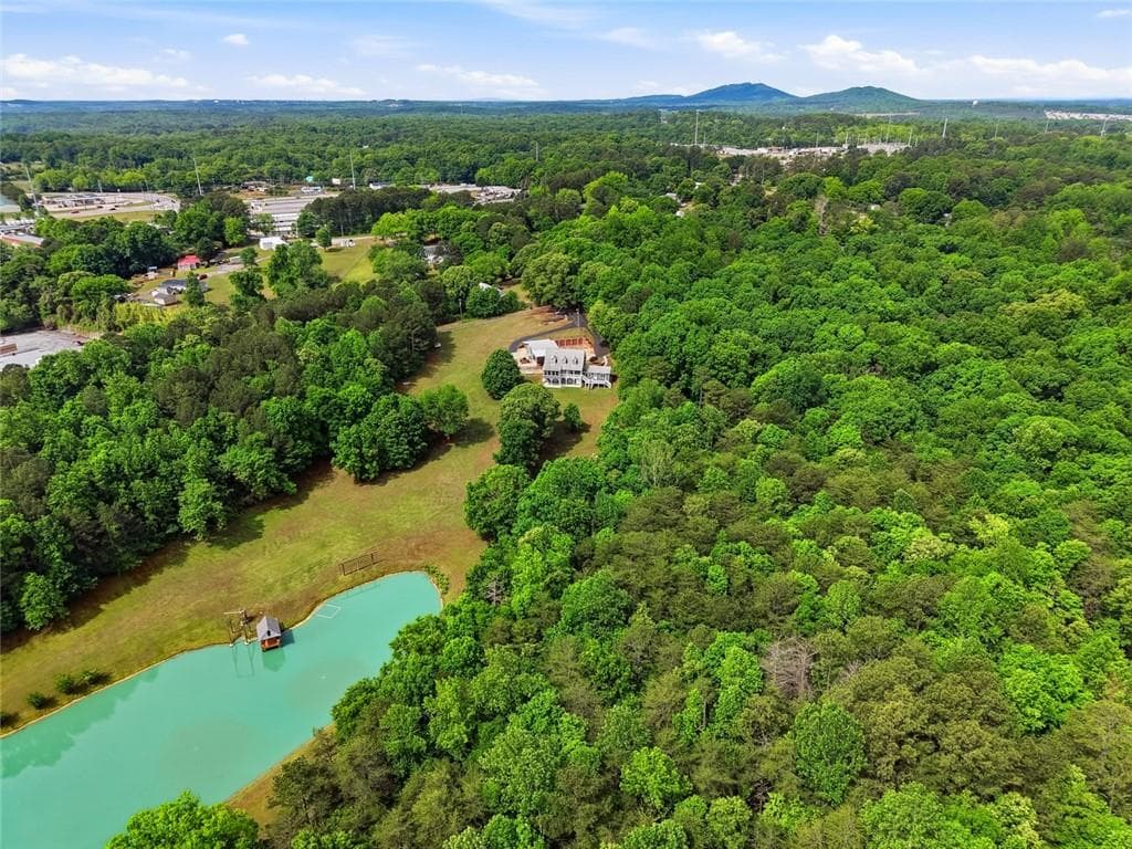 4 bedroom, 4 bathroom, 4,218 sq ft single family residence for sale at 5021 Elrod Circle, Cumming, GA 30041 — photo 3