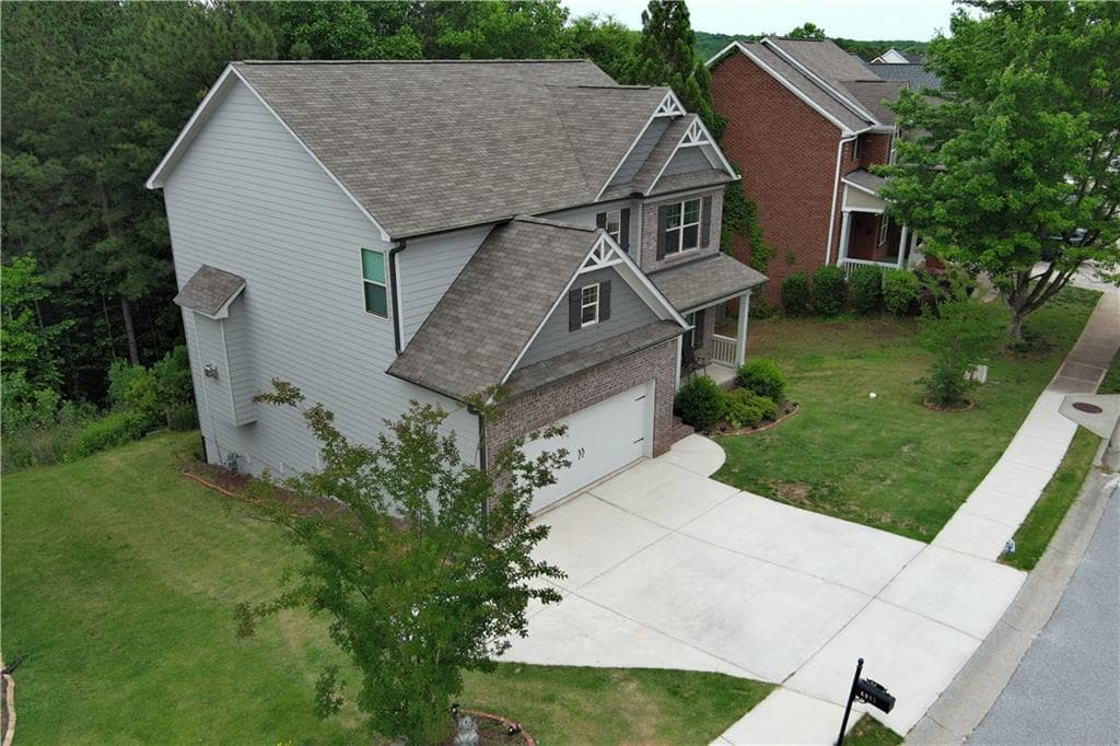 4 bedroom, 3 bathroom, 2,327 sq ft single family residence for sale at 6015 Riverwood Drive, Braselton, GA 30517 — photo 8
