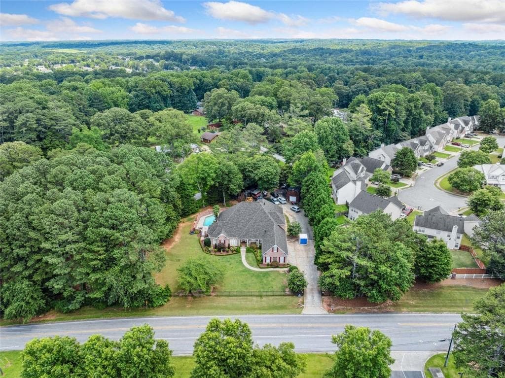 7 bedroom, 4 bathroom, 4,385 sq ft single family residence for sale at 84 Gloster Road, Lawrenceville, GA 30044 — photo 4