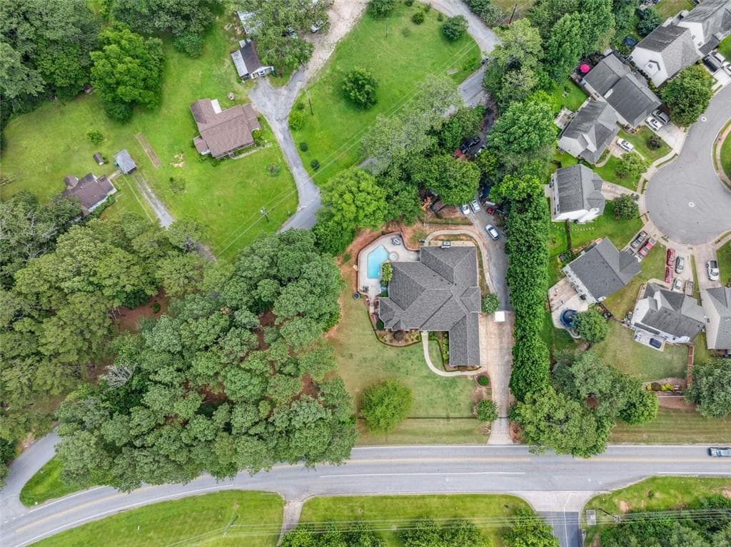7 bedroom, 4 bathroom, 4,385 sq ft single family residence for sale at 84 Gloster Road, Lawrenceville, GA 30044 — photo 5