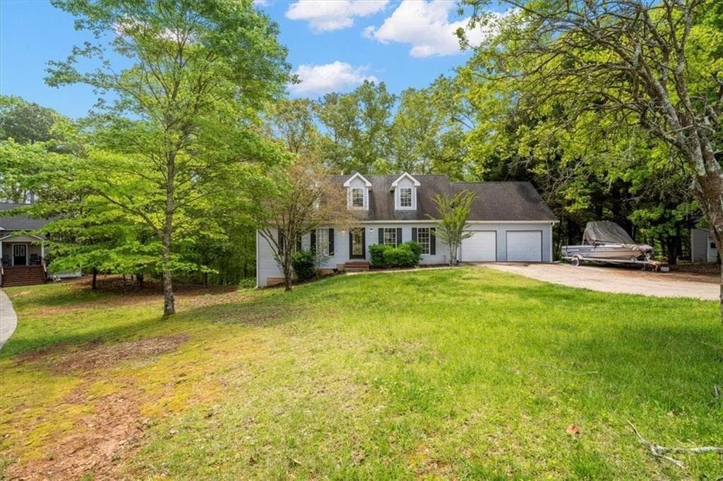 5 bedroom, 4 bathroom, 4,148 sq ft single family residence for sale at 165 Colony Circle, Canton, GA 30114 — photo 2