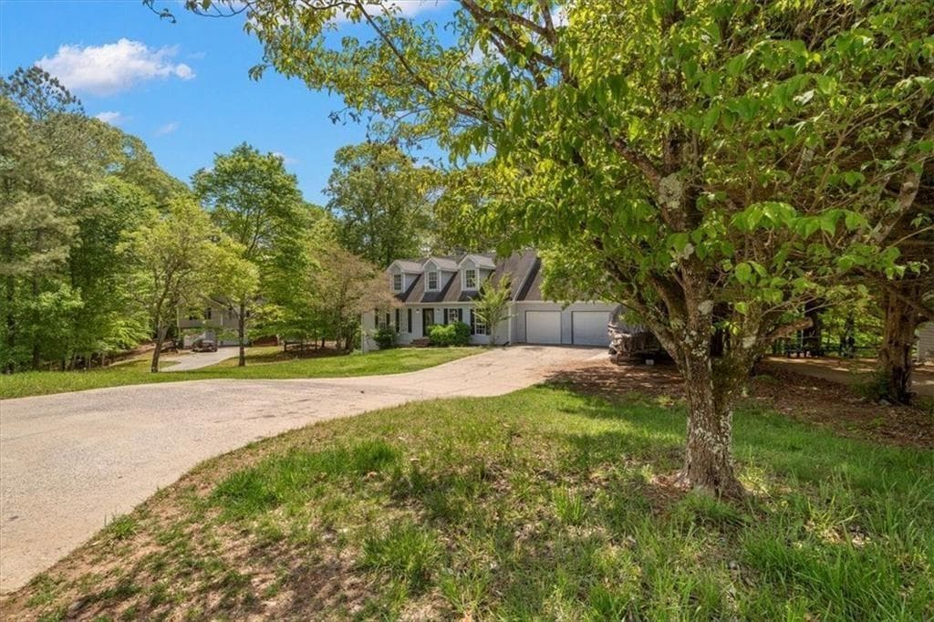 5 bedroom, 4 bathroom, 4,148 sq ft single family residence for sale at 165 Colony Circle, Canton, GA 30114 — photo 3