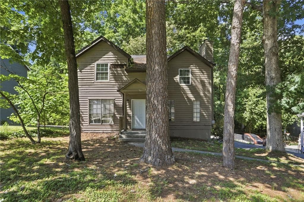 4 bedroom, 3 bathroom, 1,888 sq ft single family residence for sale at 3848 Valley Brook Road, Snellville, GA 30039 — photo 1 of 47
