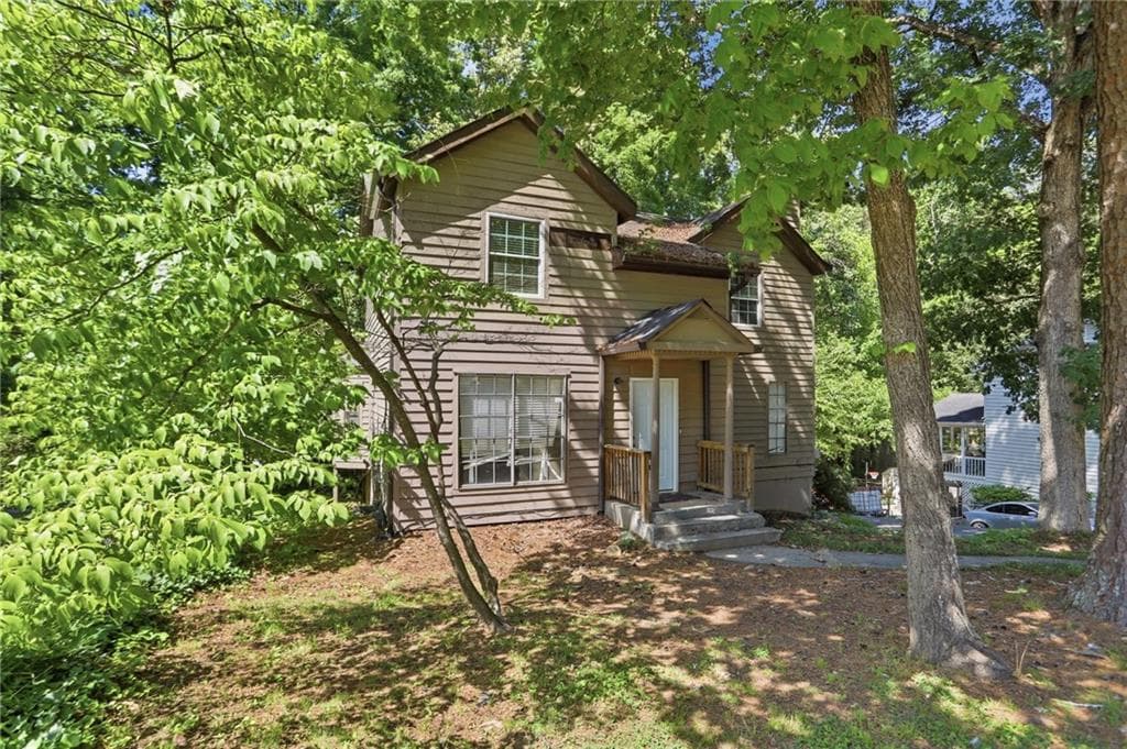 4 bedroom, 3 bathroom, 1,888 sq ft single family residence for sale at 3848 Valley Brook Road, Snellville, GA 30039 — photo 2