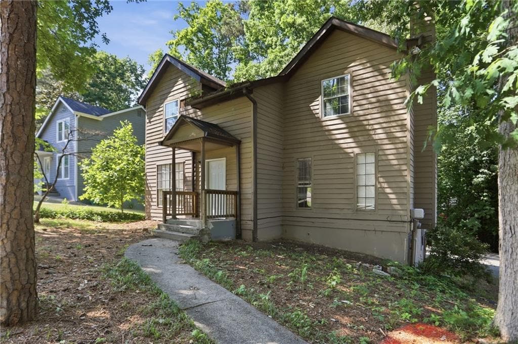 4 bedroom, 3 bathroom, 1,888 sq ft single family residence for sale at 3848 Valley Brook Road, Snellville, GA 30039 — photo 3