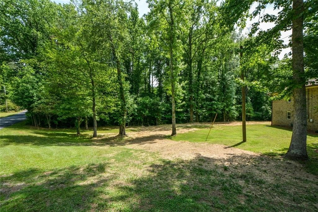 3 bedroom, 2 bathroom, 2,086 sq ft single family residence for sale at 5851 Wills Orchard Road, Cumming, GA 30040 — photo 5