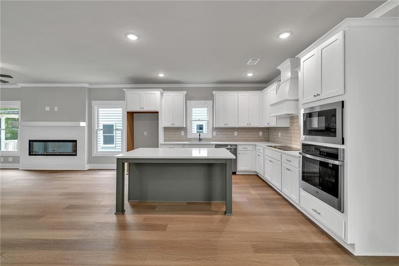 4 bedroom, 3 bathroom, 2,477 sq ft single family residence under contract at 231 E Marable Street, Monroe, GA 30655 — photo 6