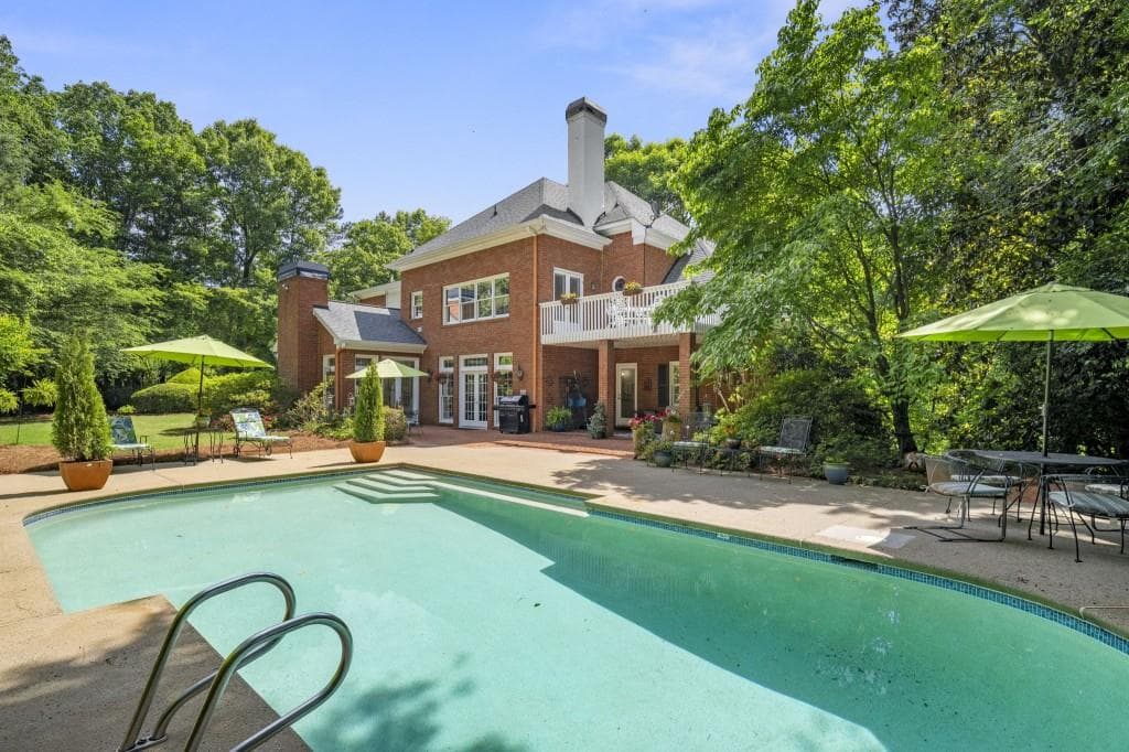 5 bedroom, 6 bathroom, 4,705 sq ft single family residence under contract at 9100 Huntcliff Trace, Sandy Springs, GA 30350