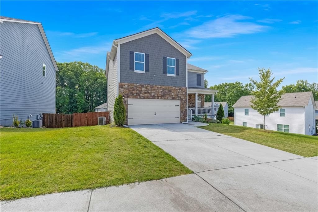 5 bedroom, 4 bathroom, 3,047 sq ft single family residence for sale at 575 Walnut Grove Way, Pendergrass, GA 30567 — photo 2