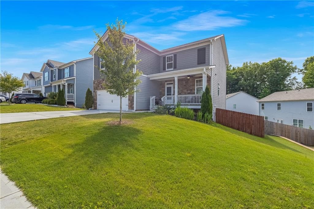 5 bedroom, 4 bathroom, 3,047 sq ft single family residence for sale at 575 Walnut Grove Way, Pendergrass, GA 30567 — photo 4