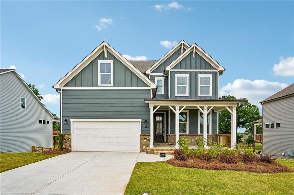 4 bedroom, 4 bathroom, 2,655 sq ft single family residence sold at 654 Grand Wehunt Drive, Hoschton, GA 30548
