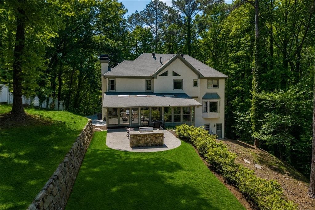 4 bedroom, 4 bathroom, 4,270 sq ft single family residence for sale at 9570 Huntcliff Trace, Sandy Springs, GA 30350