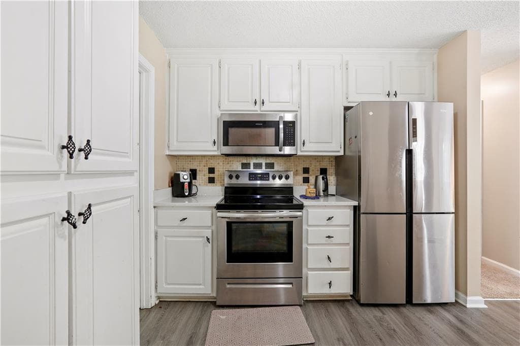 5 bedroom, 3 bathroom, 2,273 sq ft single family residence for sale at 1300 Sunflower Court, Locust Grove, GA 30248 — photo 10
