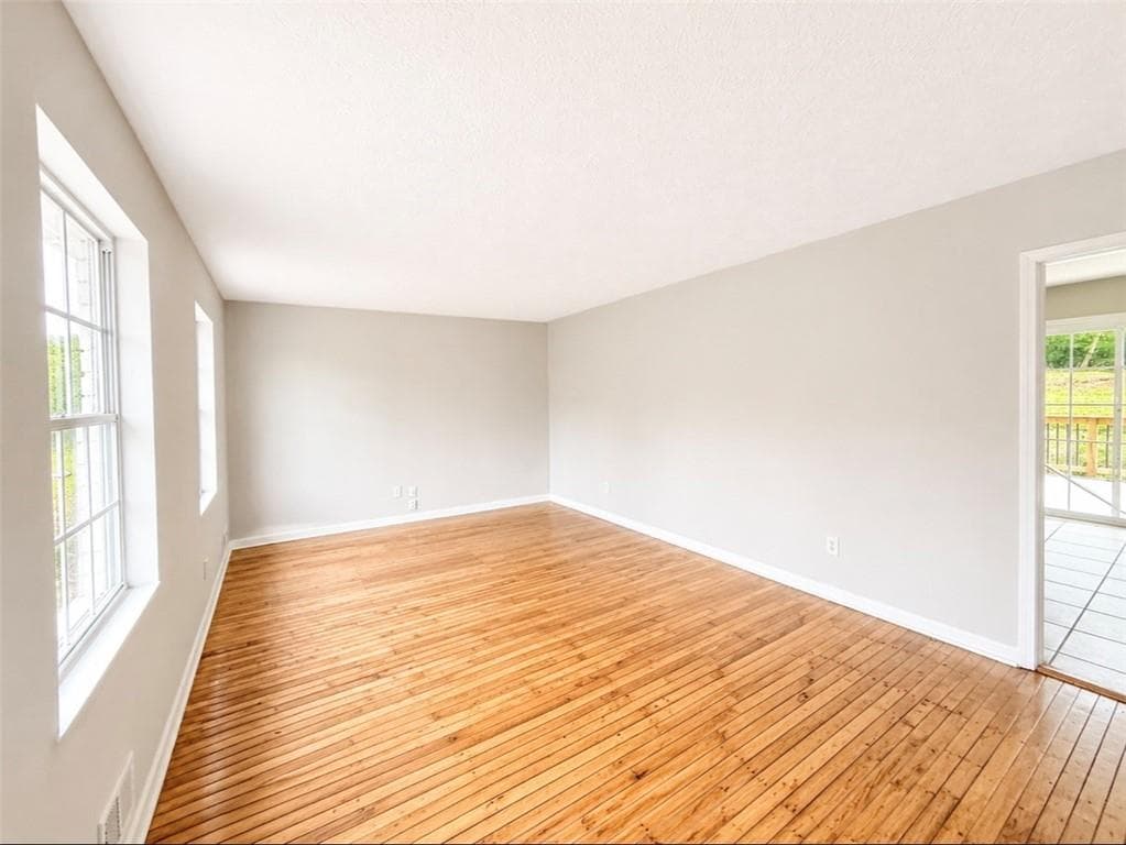 4 bedroom, 2 bathroom, 2,352 sq ft single family residence for sale at 6692 Cambridge Drive, Rex, GA 30273 — photo 4