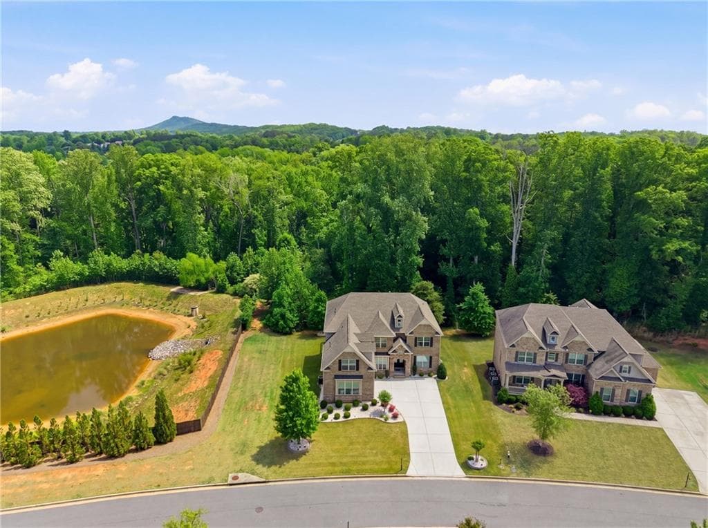 6 bedroom, 6 bathroom, 4,526 sq ft single family residence for sale at 6010 Ashborough Park, Cumming, GA 30040 — photo 4