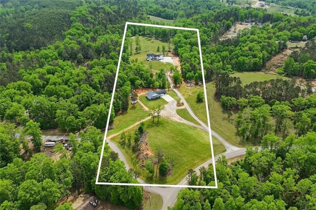 8 bedroom, 7 bathroom, 8,717 sq ft single family residence for sale at 1100 Soap Creek Road, Ball Ground, GA 30107