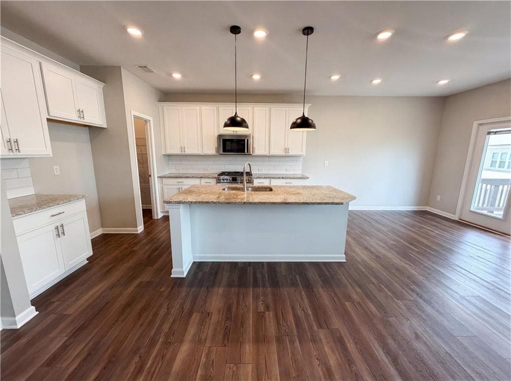 5 bedroom, 3 bathroom, 3,650 sq ft single family residence under contract at 4205 Goosecross Court, Lilburn, GA 30047 — photo 2